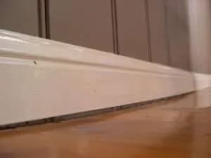 skirting boards gap floor flooring sinking UK London Subsidence sign remedy